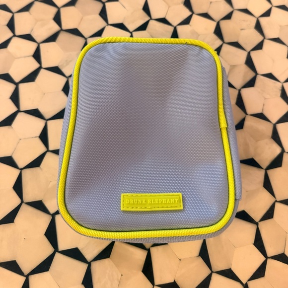 Drunk Elephant Handbags - Drunk Elephant blue yellow cosmetic pouch with zipper